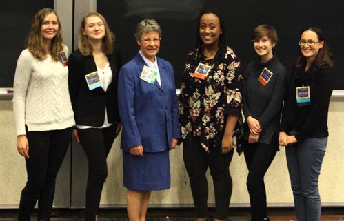 Jocelyn Belle Burnell with group at CUWiA WVU